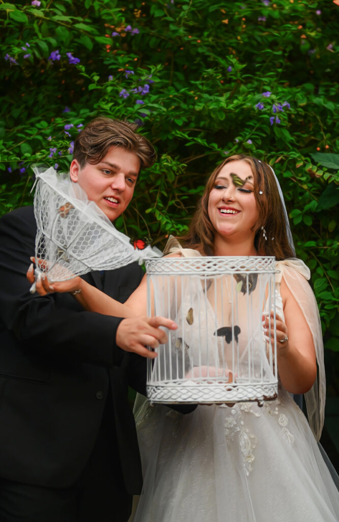 Wedding and Elopement Photography, bride and groom releasing butterflies