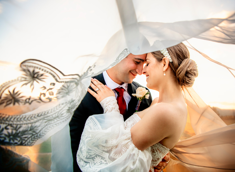 Wedding and Elopement Photography, bride and groom under bride's veil